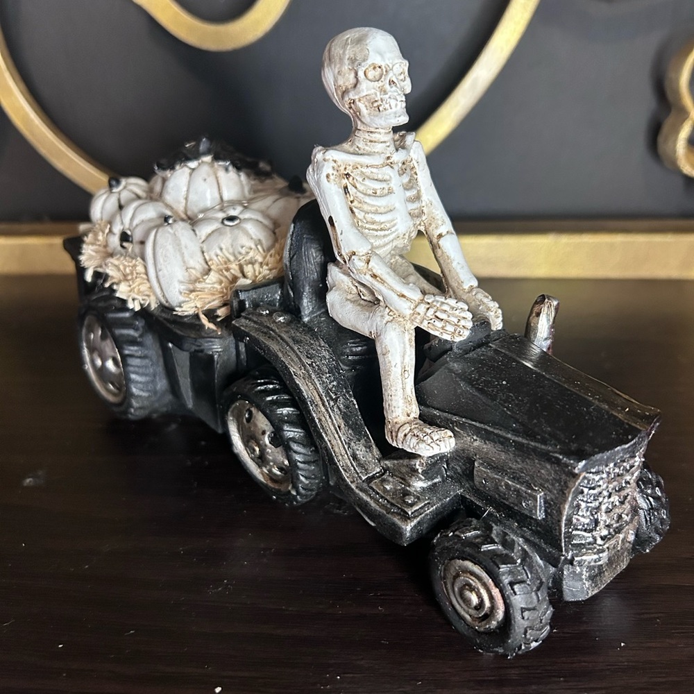 Skelton driving a tractor and minding his business
